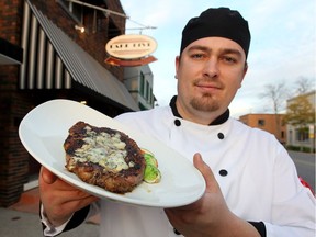 Cody Northgrave of Take Five Bistro displays a crowd favourite, a black and blue ribeye steak, at the Erie Street East location in Windsor on Nov. 14, 2016.