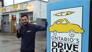 Mechanic and Drive Clean technician Ali Chehade at All Tire Service on University Avenue West, shown here on Nov. 23, 2016, has conducted hundreds of emissions tests on vehicles under the province's Drive Clean program.