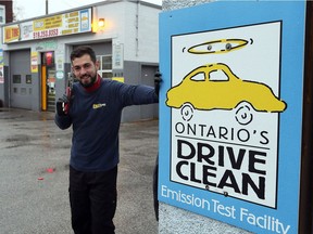 Mechanic and Drive Clean technician Ali Chehade at All Tire Service on University Avenue West, shown here on Nov. 23, 2016, has conducted hundreds of emissions tests on vehicles under the province's Drive Clean program.