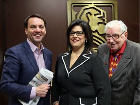 New Ontario Real Estate Association CEO Tim Hudak, left, poses with OREA director-at-large Anna Vozza and local real estate icon Bob Pedler, right, at the Bob Pedler office on Edinborough Street on Nov. 23, 2016.