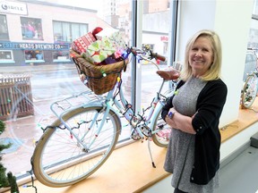 Lori Newton, executive director of Bike Windsor Essex, stands inside its new office at 101 University Ave. W.,  in Windsor.