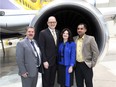 J.P. Bastien, vice-president of operation at Premier Aviation, left, Drew Dilkens, mayor of Windsor, Patti France president of St. Clair College, and Aitzaz Gurmani financial controller at Premier Aviation, are shown at a news conference on Nov. 28, 2016. Premier Aviation and St. Clair College have announced a partnership to train aircraft maintenance and repair workers.