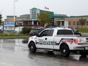 LaSalle police monitor traffic at Holy Cross Catholic School on Oct. 20, 2016.