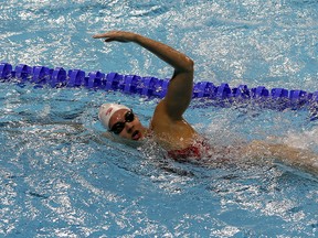 Olympic medallist Kylie Masse trains in the water at the FINA pool located at WFCU Centre on Dec. 5, 2016.