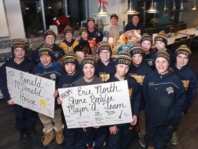 The Erie North Shore Pee Wee Major "A" Hockey Team of Kingsville, Harrow and Leamington donatied a Trolley full of food, staples and sundry items to the Ronald McDonald House in Windsor, ON. on Monday, December 19, 2016. The team poses for a photo in the kitchen area of the Ronald McDonald house.