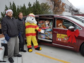 FCA Windsor Assembly Plant employees delivered several Dodge Grand Caravan and Chrysler Town and Country minivans stuffed with about $35,000 worth of toys to Sparky’s Toy Drive on Dec. 8, 2016.