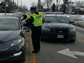 Tecumseh OPP hand out Tim Hortons gift cards to sober drivers as part of a ‘positive ticketing program.’
