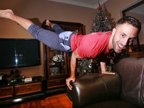 James Heugh strikes a pose in his parents' home in Amherstburg on Dec. 20, 2016. An acro artist, Heugh performed with the AcroArmy for the America's Got Talent Christmas Special.