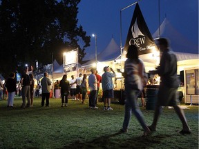 Wine lovers sample wine at the opening night of the Shores of Erie Wine Festival in Amherstburg on Sept. 6, 2012.