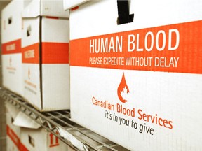Canadian Blood Services boxes rest on a shelf in the Belleville General Hospital laboratory on July 2, 2015. A single donation of blood may save the lives of as many as three people.