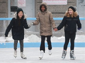 The Charles Clark Square skating rink opened for the season on Saturday, December 17, 2016. Ray Wah Say, 11, left, Mawaheb Hassan, 11, centre, and Isabella Kemeny, 10, enjoy a skate.