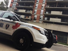 A Windsor police cruiser sits outside of  810 Ouellette Ave. on Dec. 3, 2016, where the major crimes unit was investigating a sudden death at the building.