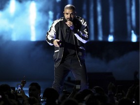 In this Sept. 23, 2016 photo, Drake performs at the 2016 iHeartRadio Music Festival at T-Mobile Arena in Las Vegas.