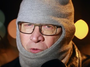 Josip Fric, father of murdered doctor Elana Fric, speaks to reporters at the candlelight vigil held at the University of Windsor on Dec. 15, 2016. Friends and family braved the sub-zero weather to honour the Essex County native.