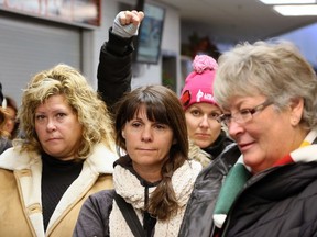 Members of CUPE Local 2974 are shown after rejecting the Essex County library board's "final offer" during a supervised vote at Essex Centre Sports Complex on Dec. 13, 2016.