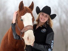 Cayla Mursall is the top-ranked youth in Ontario in barrel racing and pole bending. The Harrow teenager stands with Spooks Big Gun in Essex, Ont., on Dec. 21, 2016.
