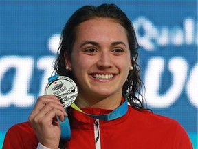 LaSalle's Kylie Masse shows off her silver medal in the 100-metre backstroke final during the 2016 FINA World Swimming Championships on Dec. 7, 2016, at the WFCU Centre in Windsor.