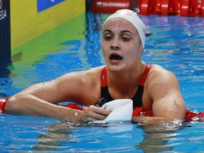LaSalle's Kylie Masse catches her breath after qualifying for the 100-metre backstroke final during the 2016 FINA World Swimming Championships (25m) on Dec. 6, 2016 at the WFCU Centre in Windsor, Ont.