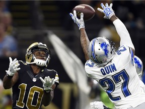 Detroit Lions free safety Glover Quin (27) tries to break up a pass intended for New Orleans Saints wide receiver Brandin Cooks (10) in the second half of a NFL game in New Orleans on Dec. 4, 2016.