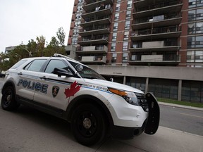 A Windsor police cruiser sits outside of Ouellette Apartments at 810 Ouellette Ave. on Dec. 3, 2016.