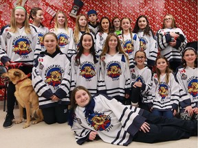 The Windsor WildCats PeeWee B team opted to ditch the Secret Santa gifts exchange this year and instead make a donation to the Windsor/Essex County Humane Society. The team poses for a photo after making a $400 dollar donation as well as food and shelter items for the animals.