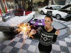 Ashley Tofflemire is all smiles as she prepares for the Canadian Transportation Museum & Heritage Village New Year's Eve party that includes a draw for a 1965 Chevy Corvair convertible.