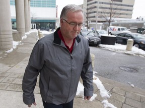 Kingsville Fire Chief, Bob Kissner, leaves Ontario Court of Justice Monday, Dec. 12, 2016.