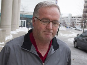 Former Kingsville fire chief Bob Kissner leaves Ontario court on Dec. 12, 2016.