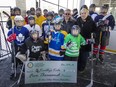 Knobby's Kids receive donation from St. Clair College for $5000 at Lanspeary Park, Saturday, Dec. 10, 2016.