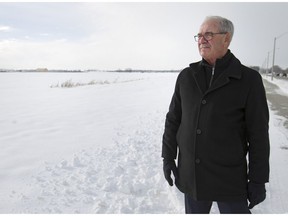 LaSalle mayor Ken Antaya is pictured next to a vacant field that could be developed in the future.