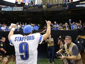 Detroit Lions quarterback Matthew Stafford (9) reacts to fans after their win over the New Orleans Saints in New Orleans, Sunday, Dec. 4, 2016. The Lions won 28-13.