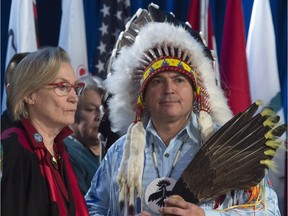 Assembly of First Nations Chief Perry Bellegarde speaks with Indigenous and Northern Affairs Minister Carolyn Bennett before the start of the Assembly of First Nations Special Chiefs assembly in Gatineau, Que. on Dec. 6, 2016.