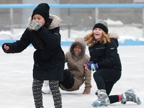 The Charles Clark Square skating rink opened for the season on Saturday, December 17, 2016. Ray Wah Say, 11, left, Mawaheb Hassan, 11, centre, and Isabella Kemeny, 10, have some laughs during a skate.