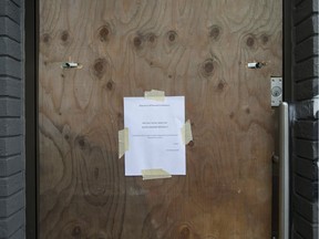 A sign offering a Door Crasher Special is posted on the entrance to the Wilistead Restaurant after someone smashed the glass door with a brick in the early morning, Saturday, Dec. 10, 2016. At least four businesses were targeted on Wyandotte Street East.