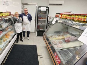 MIchelle and John Ivanisko, owners of Cottam Cold Storage and Meat Market. The longtime Cottam family business was recently hit by break-in thieves - who took an estimated $5,000 worth of beef, pork, and other meat items. Photographed Dec. 30, 2016.