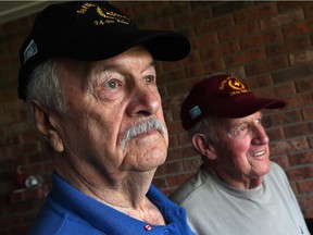 Korean veterans Henry Martinak, left, and Bernard Cote are photographed in Windsor on April 18, 2016. The two volunteered on the same day to fight in Korea.