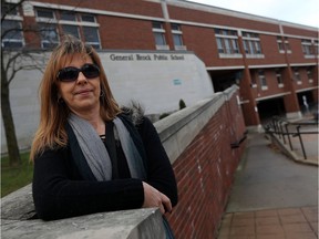 Liz Dorego, the grandmother of a six-year-old who walked away from her school, is photographed in front of General Brock Public School in Windsor on Dec. 1, 2016. The young girl was trying to make her way to the grandmother's house when she left the school and was found several blocks away an hour later.