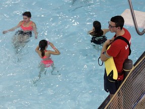 A lifeguard keeps a watchful eye over the patrons at Adventure Bay Friday, Dec. 30, 2016. City council is being asked to increase the budget for the pool.