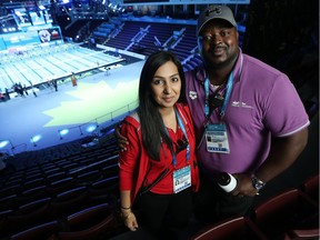 FINA interns Mandeep Bumbra, left, and Mac Kouame are photographed during a break in the swimming action at the WFCU Centre in Windsor on Dec. 7, 2016.