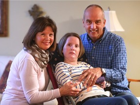 Patty, Jamie, and Garth Leno are shown at their South Windsor home on Dec. 1, 2016. Jamie will be part of be a global prom celebration for those with special needs known as Night to Shine.