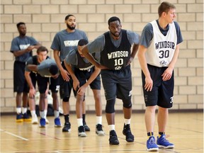Windsor Express coaches and players, including Warren Ward (10) and Wally Ellenson (30), were on the court for training camp at the John Atkinson Centre on Dec. 15, 2016.