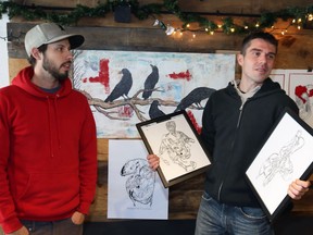 Artists Jay Santarossa, left, and Dave Mutnjakovic display some of their art work during their exhibit Gutted at Carrots N' Dates in Walkerville Sunday, Dec. 18, 2016.