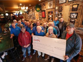 Pints for Prostate gives $9,000 to the Windsor-Essex Prostate Cancer Survivor Support Group at  the Manchester Pub in downtown Windsor on Dec. 2, 2016.