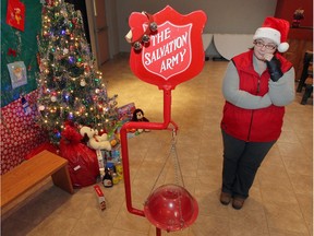 The Salvation Army is searching for more volunteers to help with its annual Christmas Kettle Campaign, as shown in this 2016 file photo.