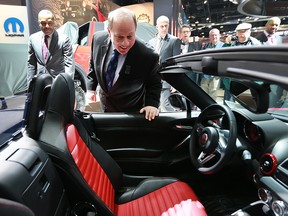 Detroit Mayor Mike Duggan had a tour of the North American International Auto Shown at the Cobo Center in Detroit, MI. on Friday, January 6, 2017. The Mayor got a sneak peek at some of the major international products that will be featured at the show and had a chance to meet some of the hundreds of workers setting up the exhibitions. Duggan checks out a FIAT 124 Spider during his tour.