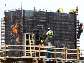 Workers are shown at the construction site for the new city hall building on Thursday, January, 26, 2017 in Windsor, ON. Above average weather has made working outside tolerable for the crews.