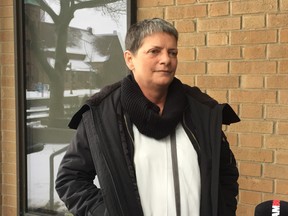 Louise Martens leaves Superior Court in Windsor after speaking to a hearing about the impact of being a victim of diluted chemotherapy drugs.