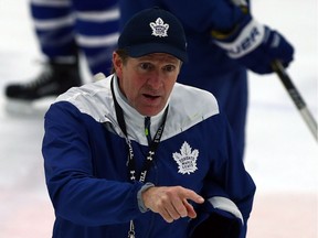 Coach Mike Babcock directs the team during Leafs practice at the Mastercard Centre in Toronto on Nov. 9, 2016.