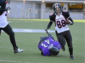 Emilie Halle is shown in action playing for the Detroit Dark Angels of the Women's Football Alliance. Halle, a former University of Windsor track athlete, has made the roster of Canada's national tackle football team, which will compete at the 2017 IFAF Women's World Championship in June.