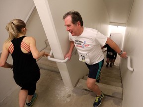 Samantha Britton, left,  and Dr. Dante Morassutti during the 2017 EUROPRO VERTICAL CLIMB fundraising event Sunday, Jan. 15, 2017 at the One Riverside Drive West building stairwell (13 floors).   The fundraising event invited the community to assist the Neurosciences Program at Windsor Regional Hospital by participating in a run/walk on up the stairs of the building.